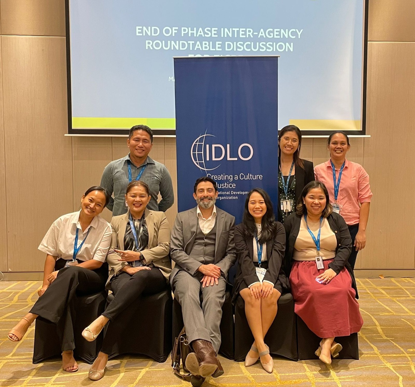 IDLO colleagues gathered together at an event