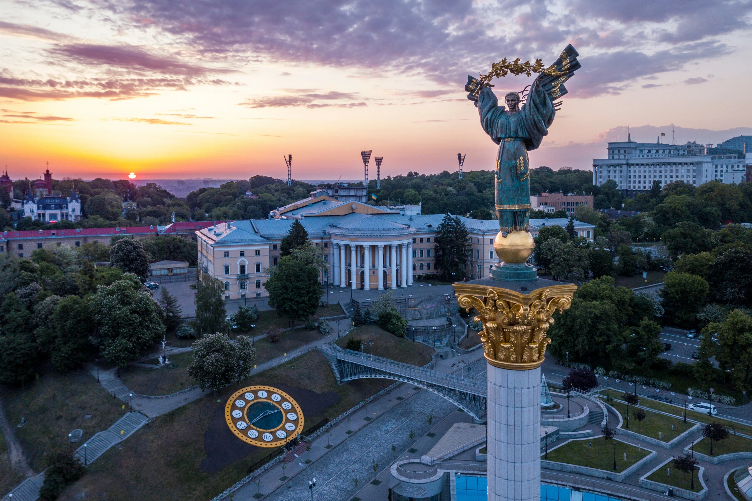 Independence Monument and cityscape in Kyiv at sunset